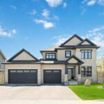 Houses For Sale in Kanata, Jason Polonski, Realtor, Ottawa, 2023-05-14. Detached home with 3 car garage, blue sky. Home For Sale by Jason Polonski, Ottawa and Kanata Realtor