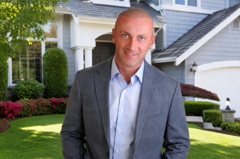 Jason Polonski- Realtor in Kanata, Ottawa in front of a house